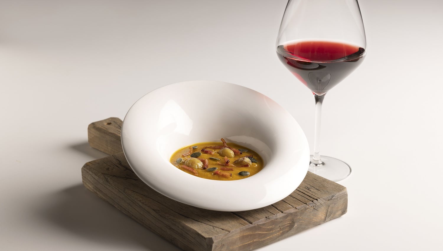 Crema di zucca e castagne con speck croccante